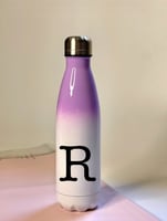 مطارة ماء لون بنفسجي