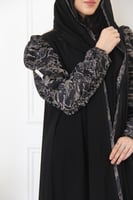 عباية بقماش لمياء و الاكمام جاكار مع الاطراف و بوف...