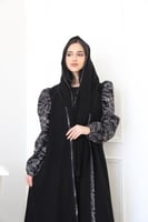 عباية بقماش لمياء و الاكمام جاكار مع الاطراف و بوف...