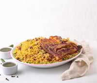 نصف دجاج على الفحم مع الرز