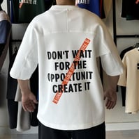 تيشيرت اوفر سايز لون ابيض بكتابة لون اسود