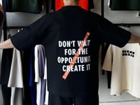 تيشيرت اوفر سايز لون اسود بكتابة لون ابيض