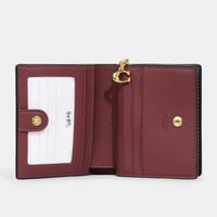 محفظة كوتش سناب