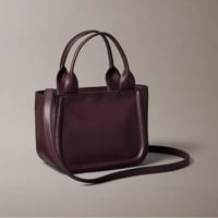 شنطة يد كالفن كلاين لون برغندي