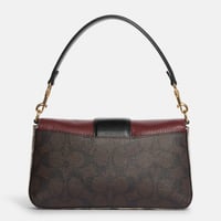 حقيبة كوتش الجديدة جريس ميني قماش مميز