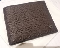 محفظة اقنر جلد منقوش