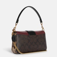 حقيبة كوتش الجديدة جريس ميني قماش مميز