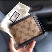 محفظة قوتشي الرجالية