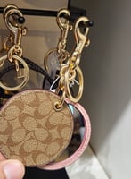 ميدالية كوتش و مرآة