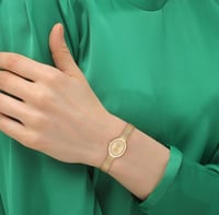 ساعة كوتش نسائية سامي ذهبي