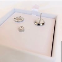 اقراط مايكل كورس فضي