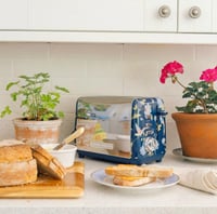 توستر عصافير كحلي صغير