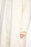 سترة نسائية طويلة منفوخة – لون الحجر – دفء وأناقة...