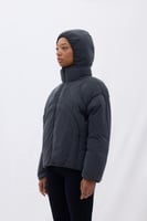 اكتشفي الدفء العصري مع جاكيت منفوخ نسائي بلون مكوا...