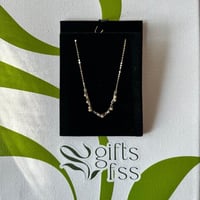 سلسال ذهب عيار 18 بتصميم كروي ناعم