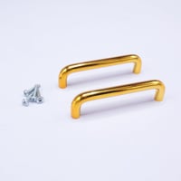 مسكة صينية شكل حرف يو لون ذهبي مقاس10*2.5