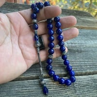 سبحة راقية من أحجار اللازورد برأس من الفضة الخالصة...