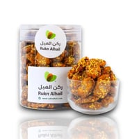 بيكان ملبس مكرمل بالسمسم