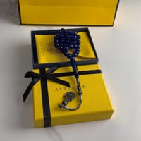 سبحة ازرق غامق بكلايت مع طربزونه فضة.