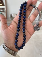 سبحة من حجر عين النمر ازرق مع طربزونة فضة وفواصل ف...