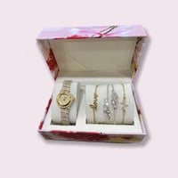 ساعة نسائية ذهبي مع فضي كريستال