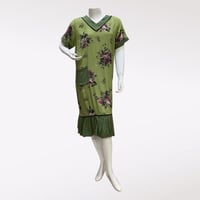 قميص نسائي قصير بجيب