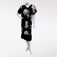 قميص نسائي قصير بجيب