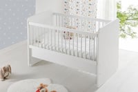 سرير هزاز ابيض