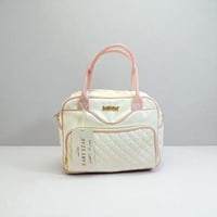 شنطةموااليد جلد للامهات