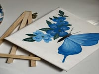 لوحة الفراشة المزهرة الزرقاء