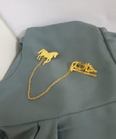 بروش السيف والشماغ بالاسم