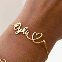 اسوارة مطلية ذهب عيار 21 مع اسم