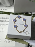 إسوارة Van cleef ذهبي -فيروزي مميز