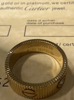 خاتم cartier ذهبي بفصوص