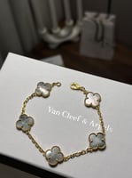 إسوارة Van cleef ذهبي - فيروزي