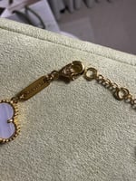 إسوارة Van cleef ذهبي - فيروزي مخطط