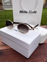 نظارة miu miu إطار بني غامق - عدسة بني مدرج