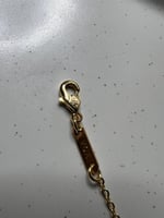 إسوارة Van cleef ذهبي - أسود