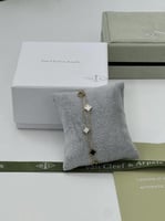 إسوارة Van cleef ذهبي _ أسود- أبيض