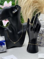 طقم Dior ذهبي