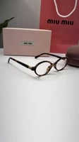 نظارة MIU MIU تايقر عدسة شفافة