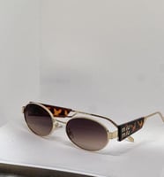 نظارة - MIU MIU اطار تايقر - عدسة بني مدرج