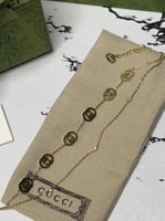 اسوارة GUCCI معدن ذهبي او فضي