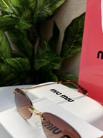 نظارة miu miu أطار ذهبي تايقر عدسة بني