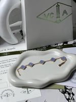 إسوارة Van cleef ذهبي -فيروزي مميز