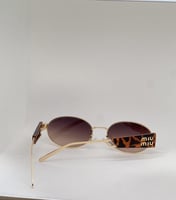 نظارة - MIU MIU اطار تايقر - عدسة بني مدرج