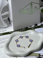 إسوارة Van cleef ذهبي -فيروزي مميز