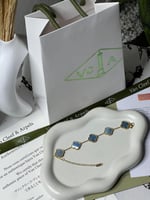 إسوارة Van cleef ذهبي -فيروزي