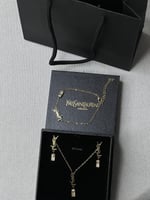 طقم سان لوران ذهبي