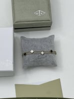 إسوارة Van cleef ذهبي _ أسود- أبيض